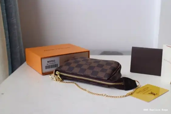 Aaa replica bags POCHETTE VUITTON ACCESSOIRES MINI LOUIS 0212